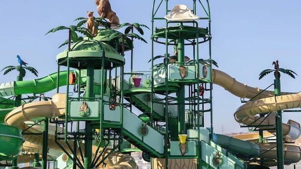A water park with a multi-level play structure, slides, and a pool area. - Sirena Beach Resort & Spa (Marsa Alam)