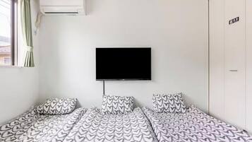 2 chambres, fer et planche à repasser, lit parapluie, Wi-Fi gratuit