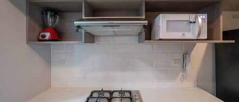 Apartamento, vista para a cidade | Cozinha privada