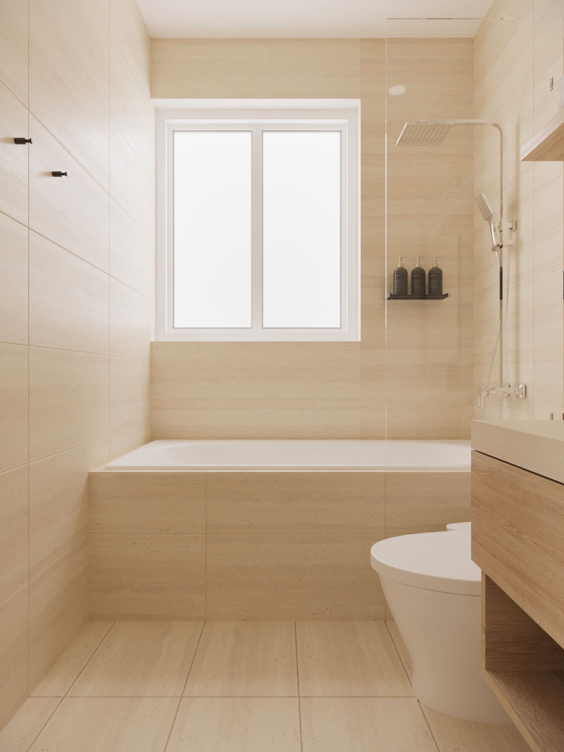 Un baño moderno con bañera, inodoro y zona de ducha.