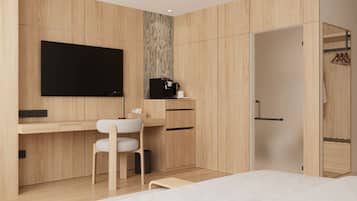 A modern bedroom with a wooden desk, a chair, a bed, and a wardrobe.