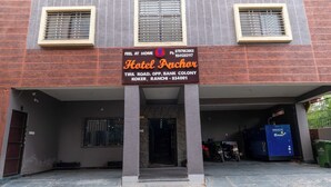 A hotel entrance with a signboard displaying the name 'Hotel Anchor' and contact information. - Hotel Anchor (Ranchi)