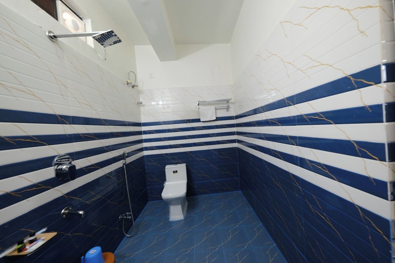 Shower, slippers, towels, soap
