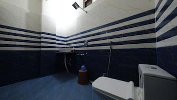 Shower, slippers, towels, soap