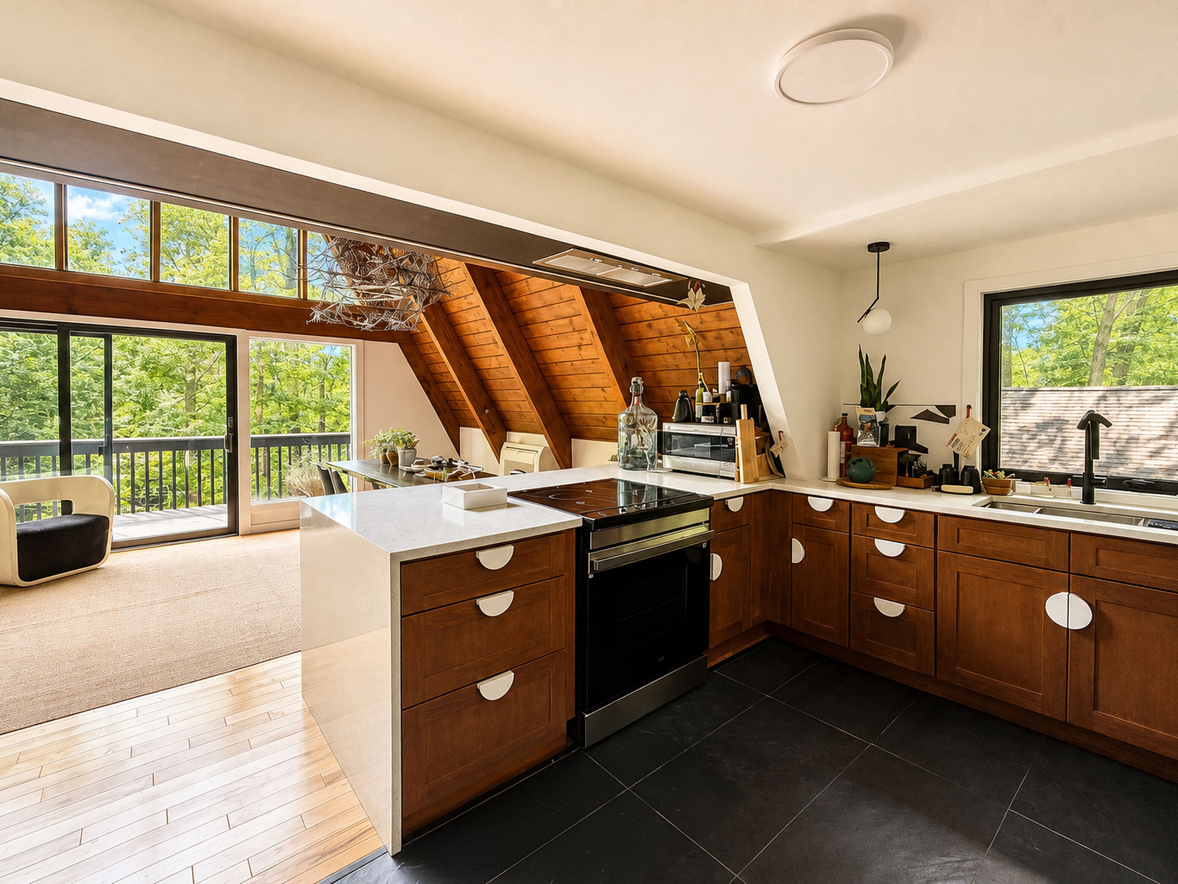A modern kitchen with a large island, wooden cabinets, and a view of the outdoors.
