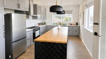 Coffee/tea maker, fridge, microwave, oven