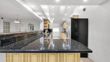 Apartamento luxo, vista para o lago | Cozinha privada