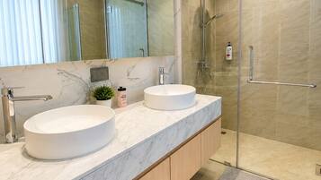Shower, hair dryer, towels, soap
