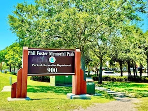 A sign for Phil Foster Memorial Park, Parks & Recreation Department, with the number 900. - Rent The Crafty Mermaid, 2-bedroom house, yard, near Blue Heron dive area (West Palm Beach)