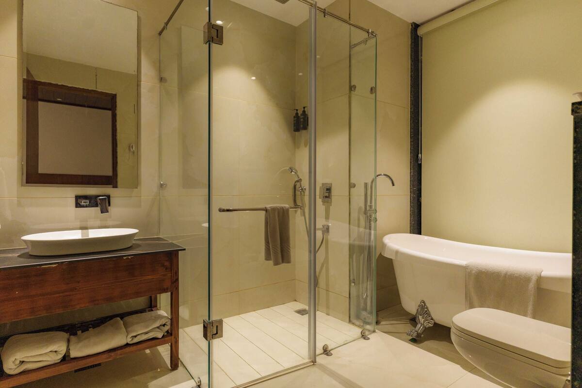 Familie suite | Badkamer | Gratis toiletartikelen, een haardroger, handdoeken, zeep