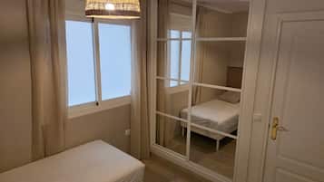 Iron/ironing board, travel crib, WiFi (free), bed sheets