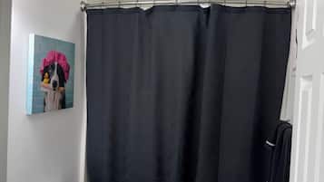 Jetted tub, hair dryer, towels
