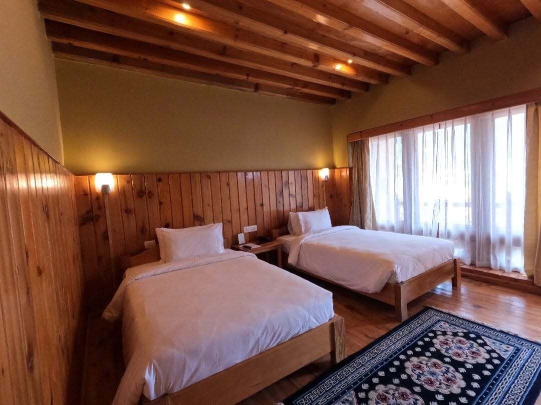 Chambre Deluxe Double ou avec lits jumeaux, balcon, vue montagne | Fer et planche à repasser, Wi-Fi gratuit