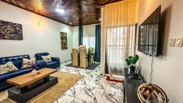 Luxury Apartment, City View | Living area