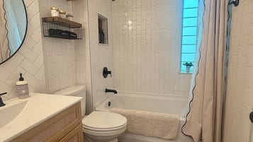 Hair dryer, towels, soap, shampoo