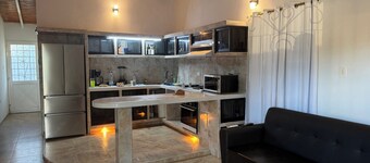 Cozy 2-bedroom house in peaceful Guanare with AC.
