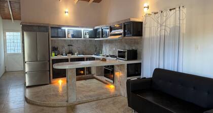 Cozy 2-bedroom house in peaceful Guanare with AC.