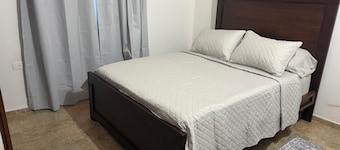 Cozy 2-bedroom house in peaceful Guanare with AC.