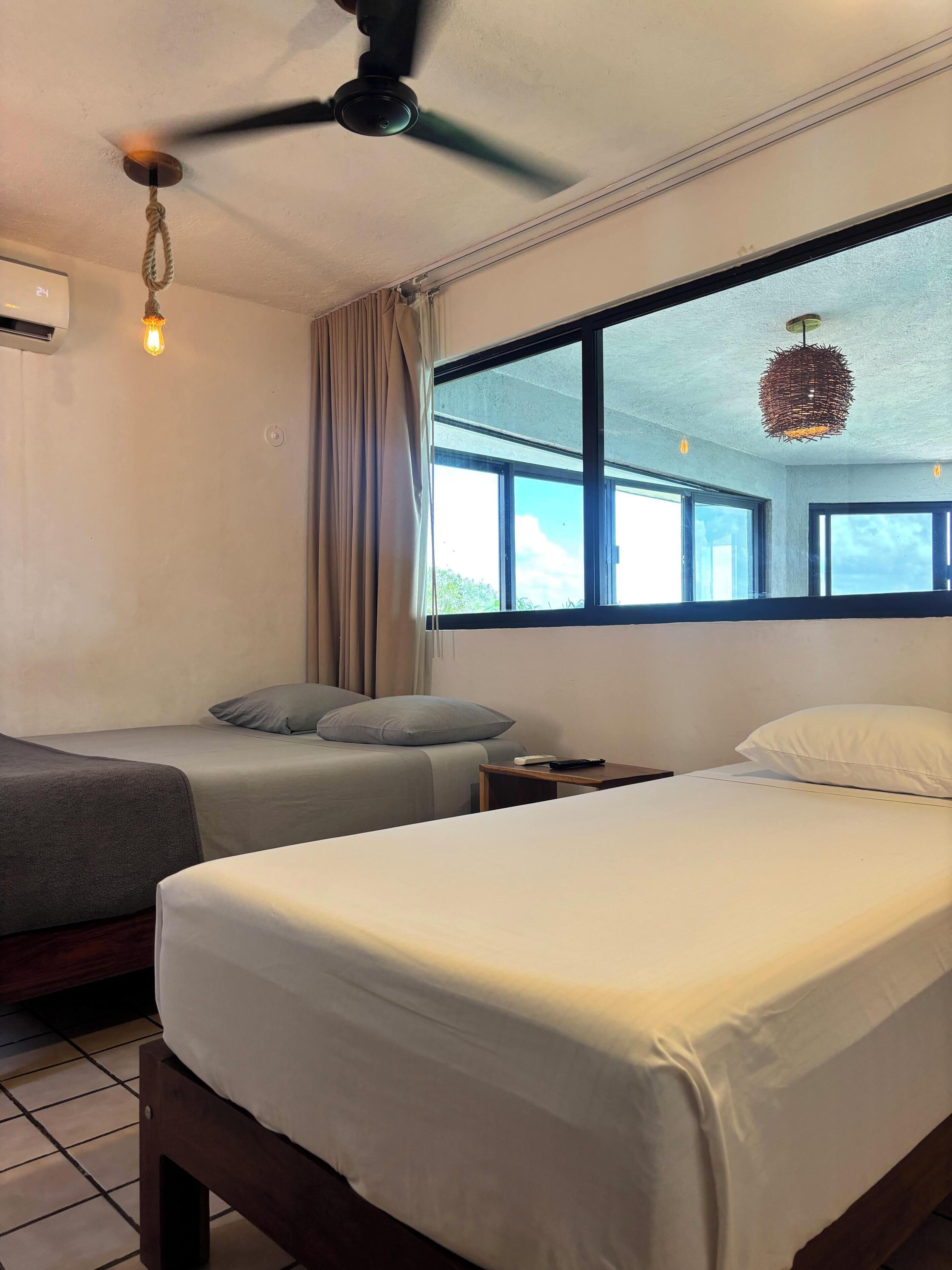 Economy Room, Balcony | Minibar (free items), WiFi (free), bed sheets