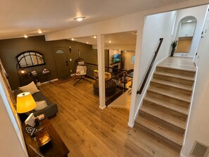 Living area - Hillside Villa • Cul-de-Sac • Hot Tub • Sleeps 10 • Wooded Lot • Mediterranean (Cedar Rapids)