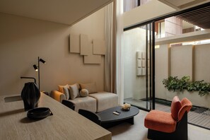 Casa de ciudad, 1 habitación, alberca privada | Área de sala de estar