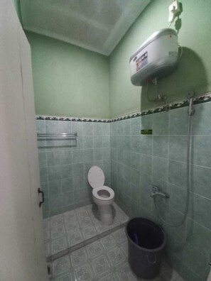 Regadera y toallas 