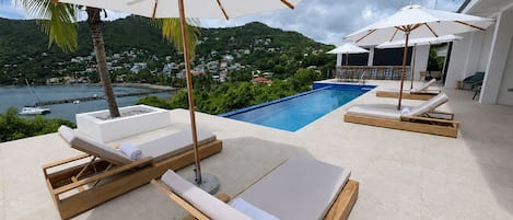 Outdoor pool, free cabanas, pool umbrellas