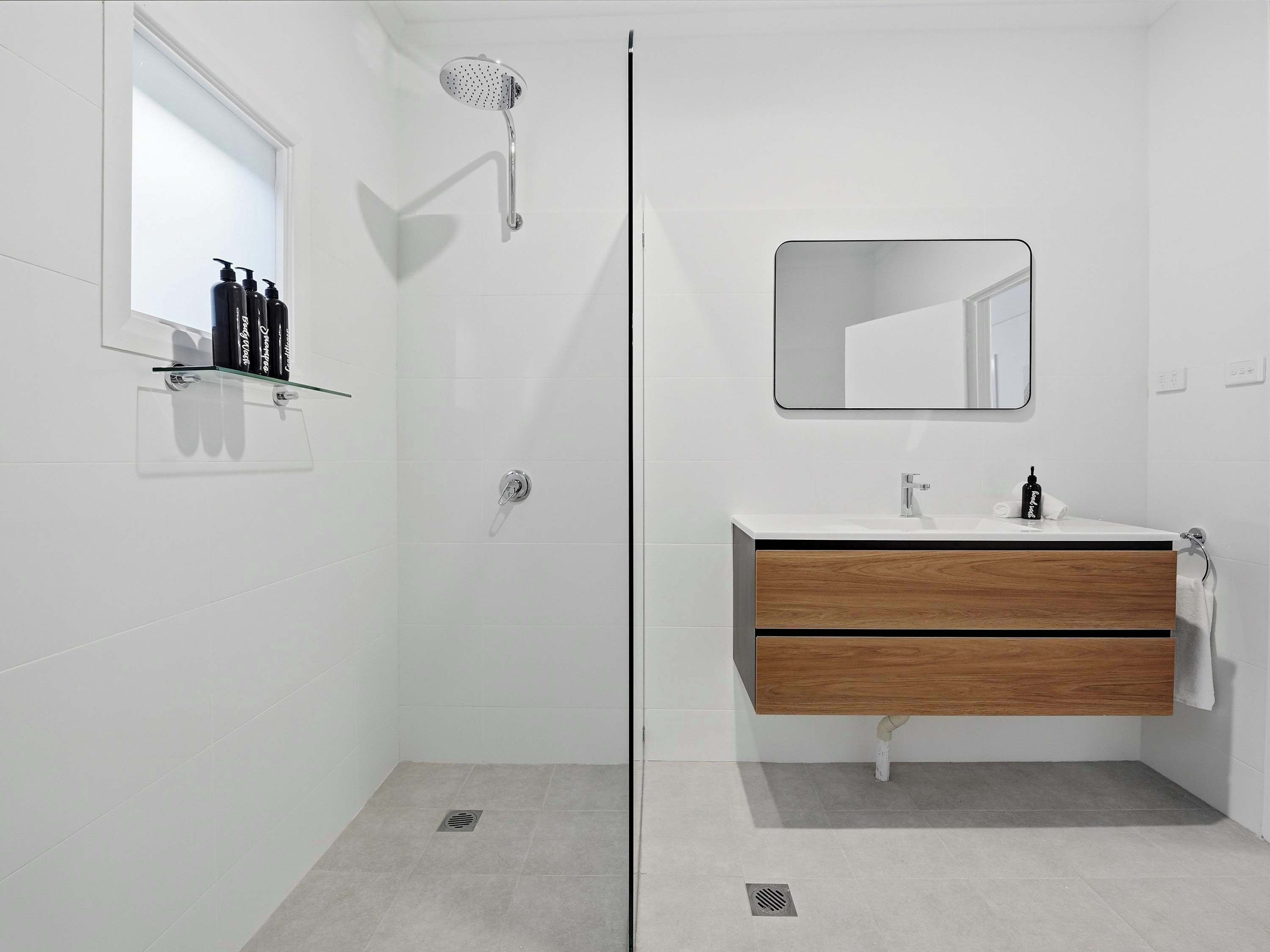 Shower, hair dryer, towels, shampoo