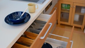 A kitchen drawer with utensils and cookware. - Glowlight 201 - 4-Bedroom Family Suite - 2-Minute Walk to Kuromon Market (Osaka)