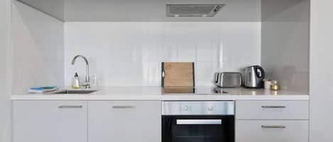 Microwave, stovetop, toaster, cookware/dishes/utensils
