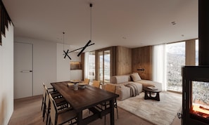 A modern interior with a dining area, sofa, and fireplace. - Lenzerheide Luxury: Spa Shower, Mountain View (Lenzerheide/Lai)