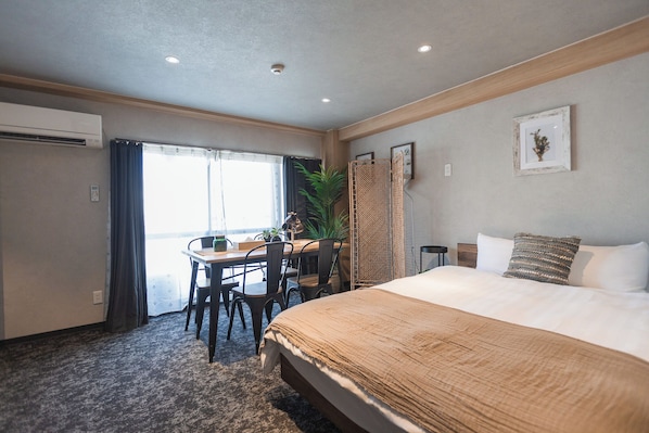 A hotel room with a bed, a desk, and a chair. - b&Dotonbori 2 (Chuo Ward)