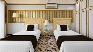 A hotel room with two beds, a small table, a lamp, and a decorative wall panel. - Sunday- Johor Bahru Near Mid Valley Southkey Formally Lace Boutique (Johor Bahru)