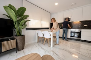 Comfort Apartment, Patio | Tempat makan