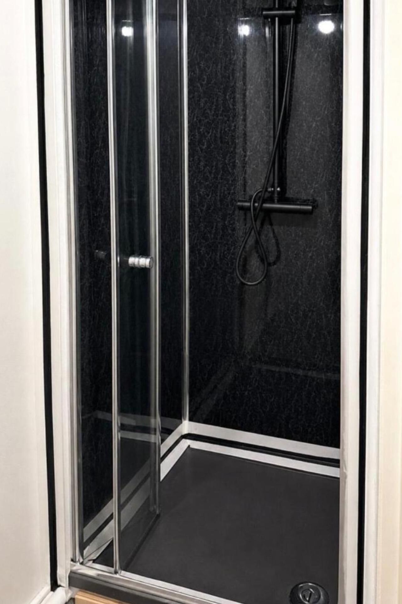 Shower, deep soaking tub, towels