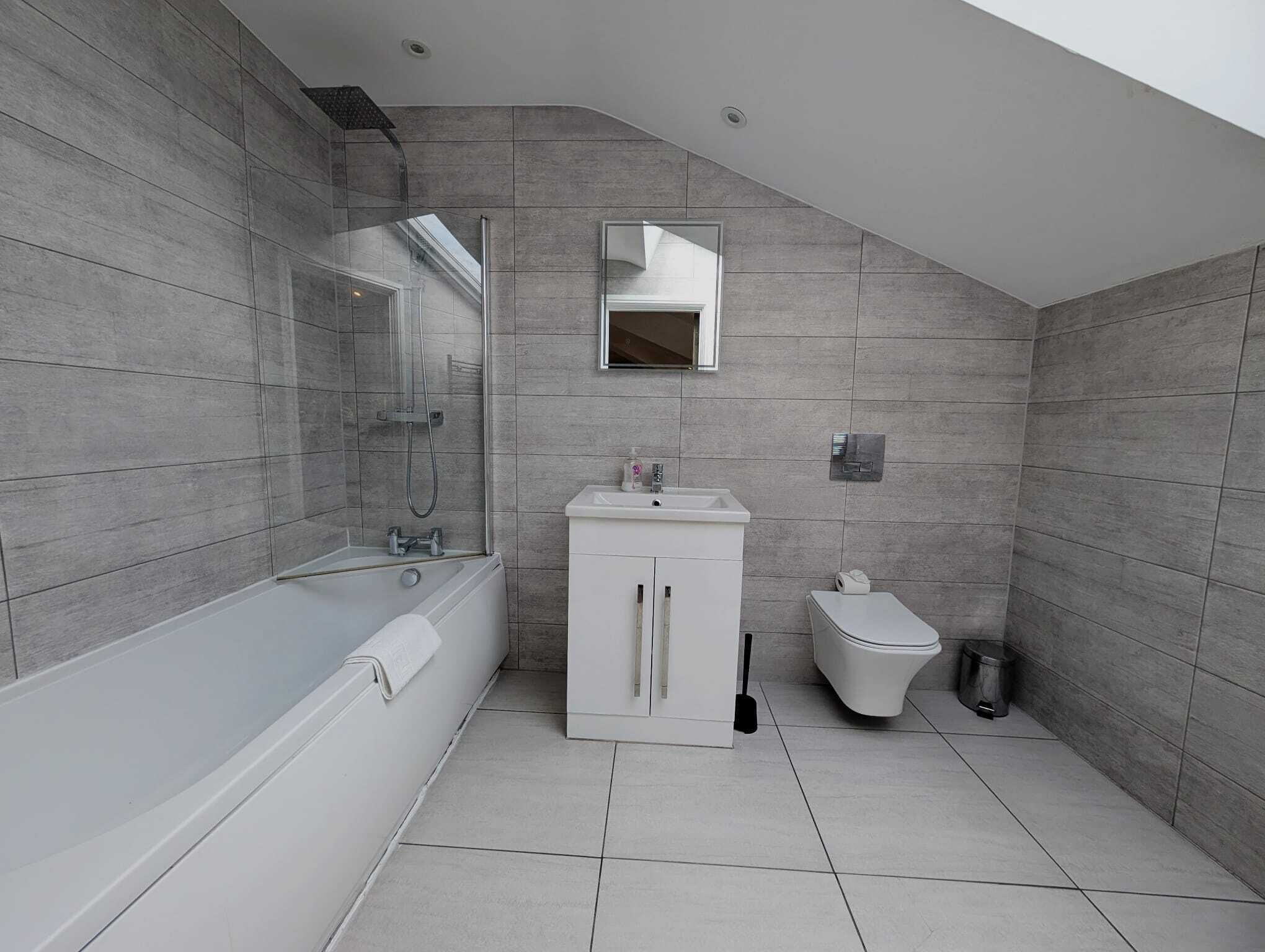 Hair dryer, towels, soap, shampoo