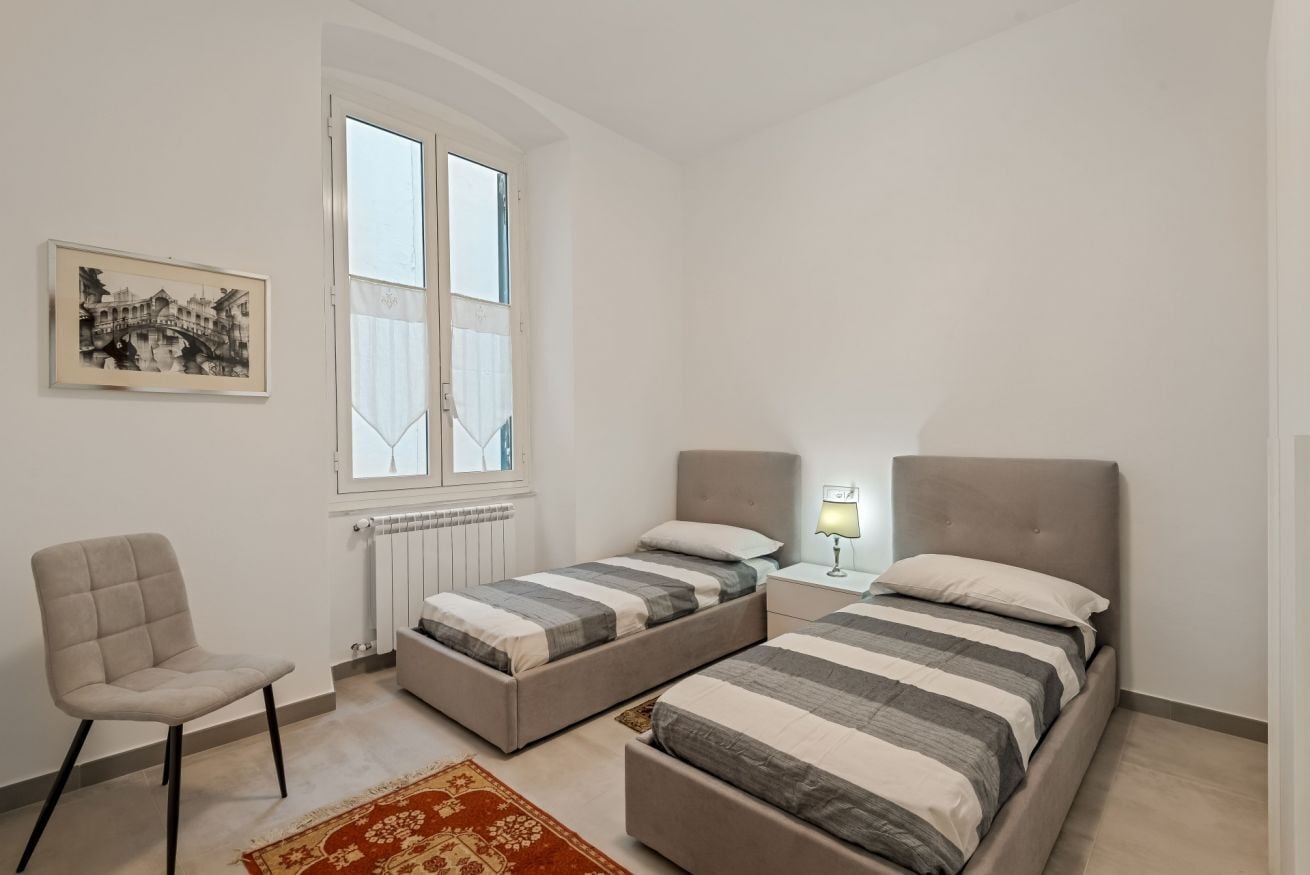 2 slaapkamers, een strijkplank/strijkijzer, beddengoed