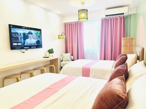 A hotel room with two beds, a television, a desk, and a window with curtains. - Stylish 2-Bed Family Suite in Mall of Asia near Airpot/NAIA/Solaire/Pasay (Pasay City)