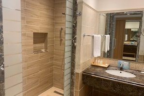 A bathroom with a shower, a sink, and a mirror. - Lahami Bay Beach Resort and Gardens (Marsa Alam)