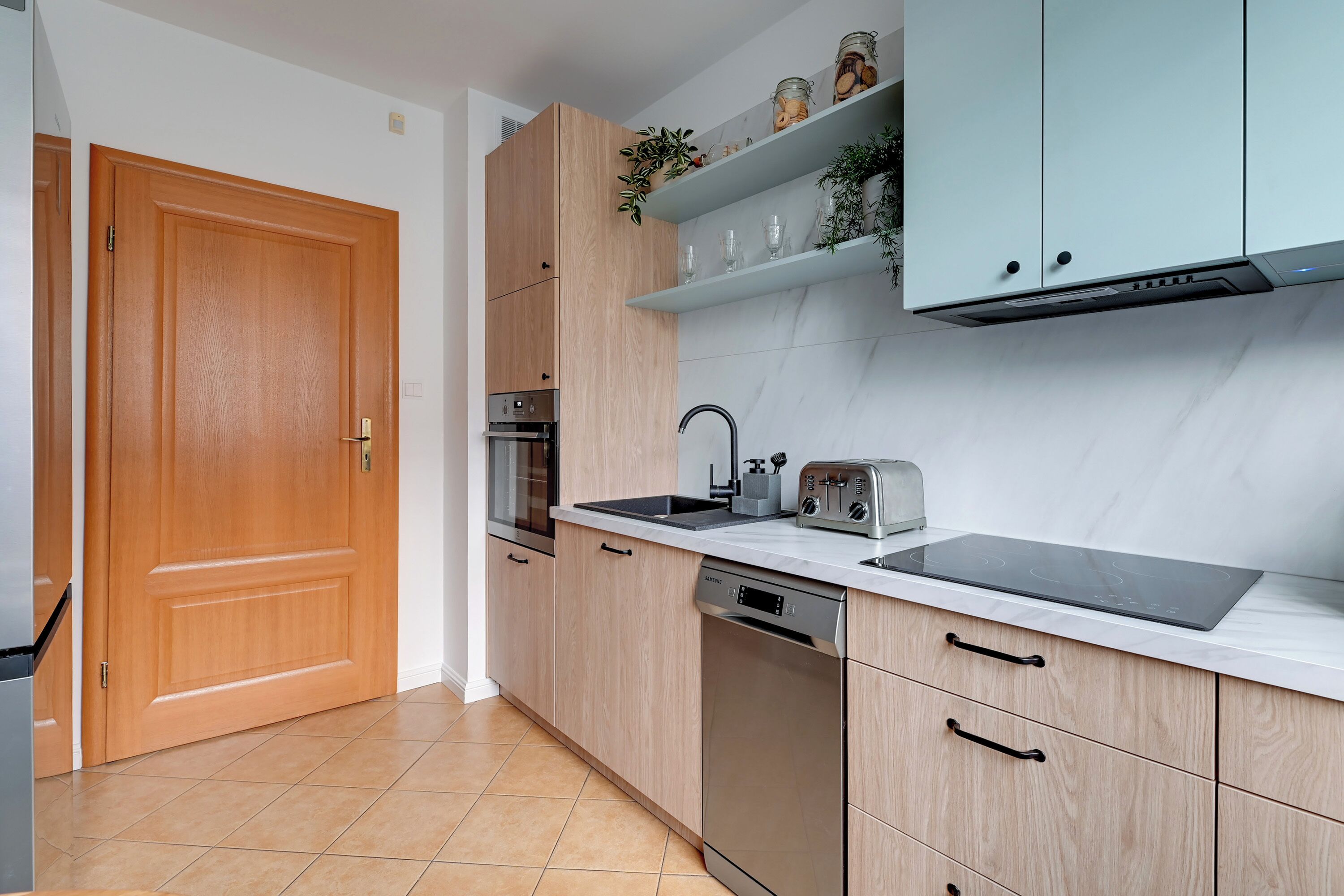 Family Apartment, Balcony | Private kitchen | Coffee/tea maker, microwave, electric kettle, toaster