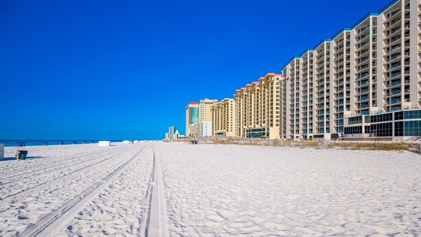 A snow-covered beach with a row of high-rise buildings. - Phoenix Iv 4062 1 Bedroom Condo (Orange Beach)
