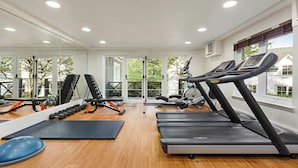 A gym with treadmills, weight machines, and free weights. - Duchally Hotel & Country Estate (Auchterarder)