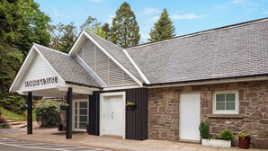 A building with a stone facade, a sloped roof, and a sign that reads 'LEISURE CENTRE'. - Duchally Hotel & Country Estate (Auchterarder)