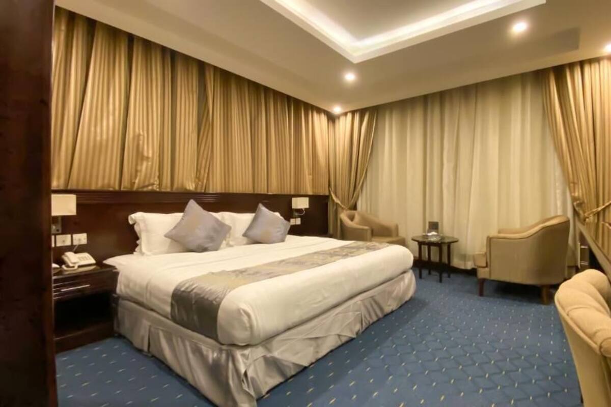 Junior Suite, City View | In-room safe, soundproofing, iron/ironing board, free WiFi