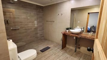 Superior Suite, Garden View | Bathroom | Shower, hair dryer, towels, soap