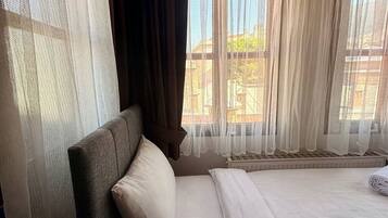 Basic Single Room | Iron/ironing board (on request), WiFi (free)