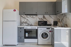 Coffee/tea maker, fridge, oven, stovetop - Kamiros Seaside Apartment in Kamiros Skala (Kamiros Skala)