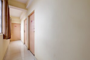 A corridor with doors numbered 403 and 404, leading to rooms.