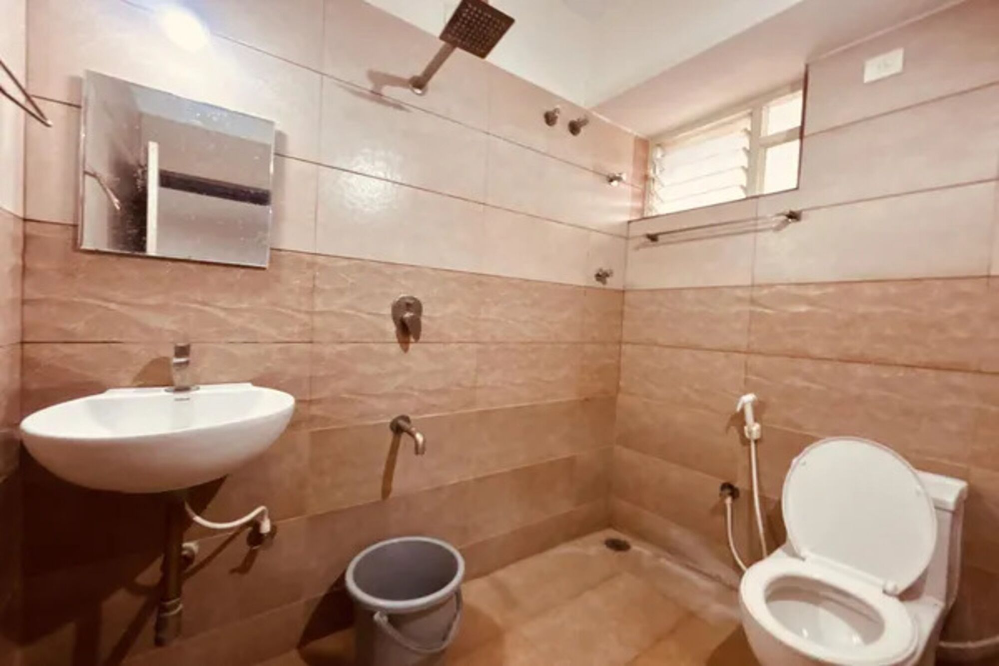 Shower, towels, toilet paper