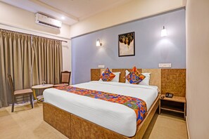 Deluxe kamer | Lakens van Egyptisch katoen, luxe beddengoed, een kluis op de kamer